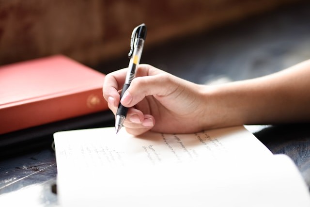 Person journaling coping strategies
